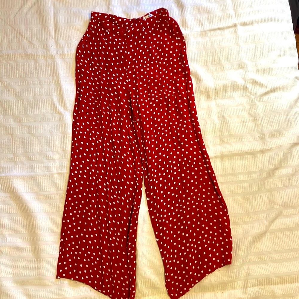 Red and white polka dot pants.